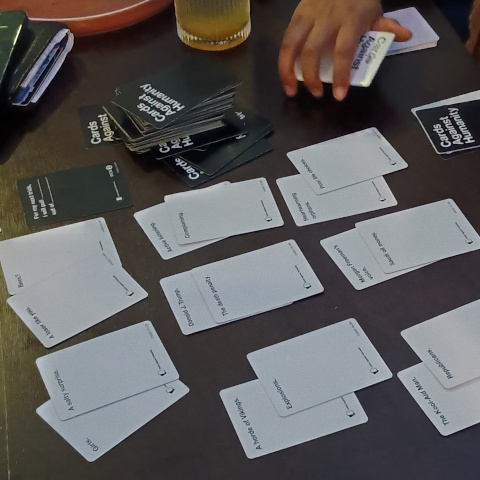 Various cards from Cards Against Humanity